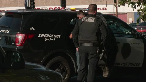 Police Interrogate Suspect In Back Of Squad Car Stock Footage 190216975