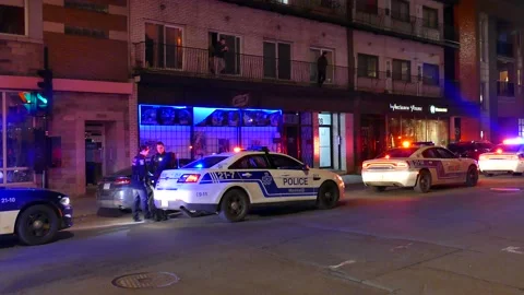 Police intervention with hanfcuffed black man Stock Footage 138620464