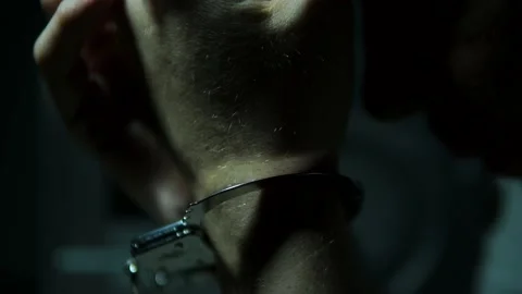 Police Interview Interrogation Room With Suspect In Handcuffs Stock Footage 134693887