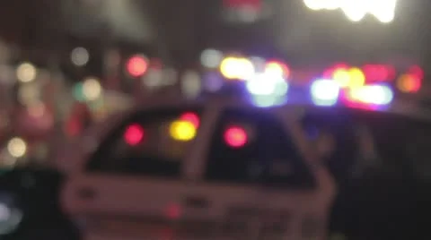 Police Lights out of focus in the background Stock-Footage 10736678