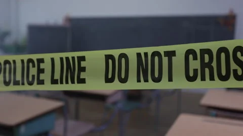 Police line do not cross close up in school Stock Footage 315269784
