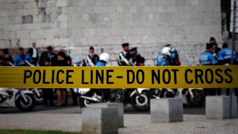 Police Line Do Not Cross Barrier at Crime Scene With Officers and Motorcycles Stock-Footage 318516949