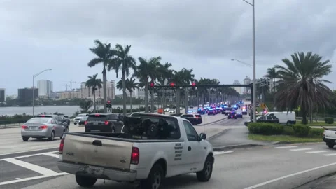 Police lined up blocking the road 스톡 동영상 172335609