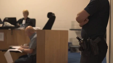 Police Officer in Court Room Stock Footage