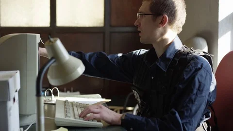 Police officer pulling file on perpetrator Stock Footage 72974006