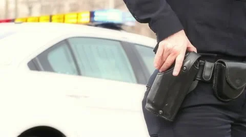 Police Officer Pulls Gun from Holster Stock Footage