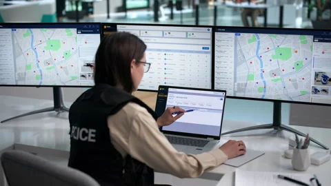 Police Officer Uses Computer Software Stock Footage 339906220