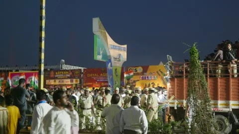Police officers managing security with crowd control in Grand Sataabdi Utsav Stock Footage 341842009