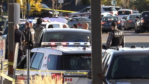 Police officers surround shopping mall d... | Stock Video | Pond5