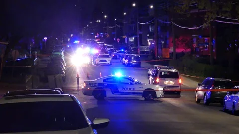 Police perimeter at shooting scene Stock Footage 114690111