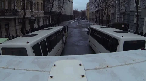 The Police preparing the streets for the forthcoming strike (fences by buses). Video stock 33336890