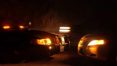 Police pull over suspect vehicle on highway Stock Footage 231125017