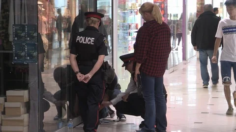 Police raid Pacific Mall stores and shops in Markham for counterfeit merchandise Stock Footage 91545377