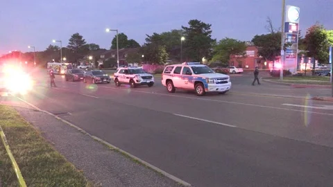 Police at scene of multiple shooting murder in city Stock-Footage 154883379