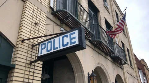 Police sign on exterior of station generic establishing Stock Footage