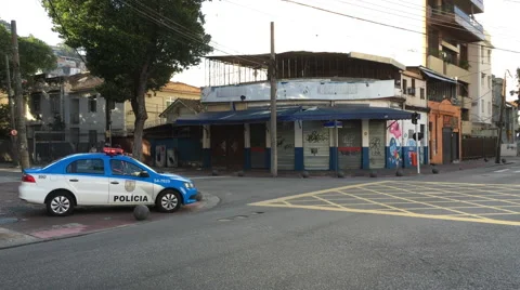 Police sitting at corner of intersection in Vila Isabel Rio de Janeiro Brazil Video stock 66414929