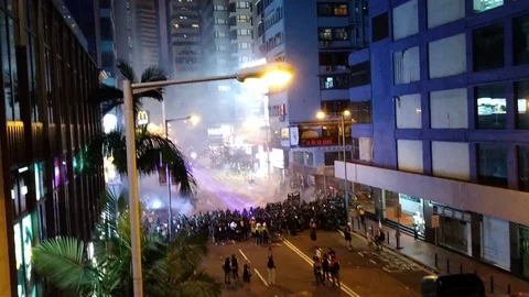 Police squad clashed with protesters in Hong Kong Stock Footage 113596399