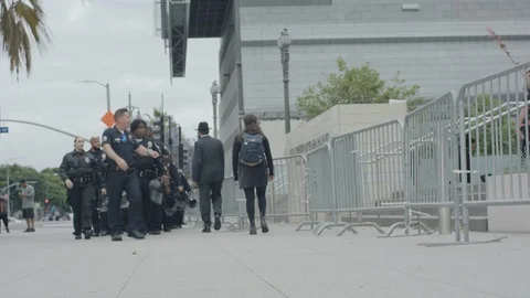 Police standing in the front of the barrier, BLM, Hollywood, LA, June 3, 2020 Stock Footage 136225602
