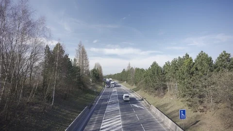 Police stopped traffic causing jam on a flat road in the middle of nature Stock Footage 126569627