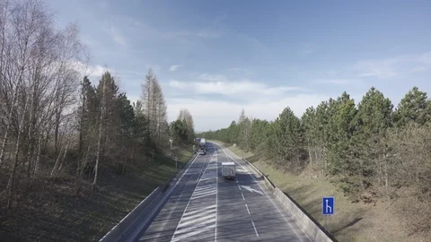 Police stopped traffic causing jam on a flat road in the middle of nature Stock Footage 126569639