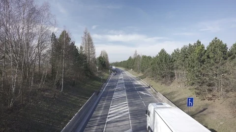 Police stopped traffic causing jam on a flat road in the middle of nature Stock Footage 126569662