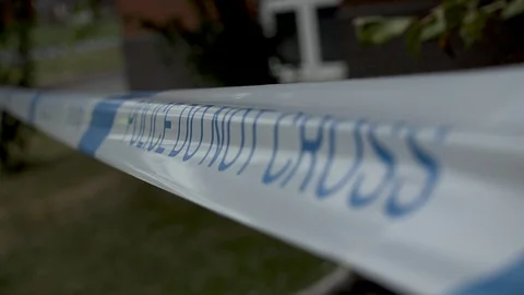 POLICE TAPE ANGLE FOCUS Stock Footage 92759512