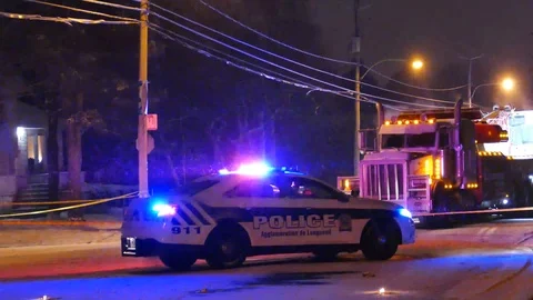 Police Taurus blocking boulevard with flashers Stock Footage 101995332