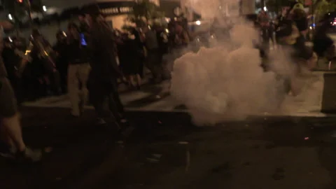 Police throw flash grenades at Black Lives Matter protesters Stock Footage 138530300