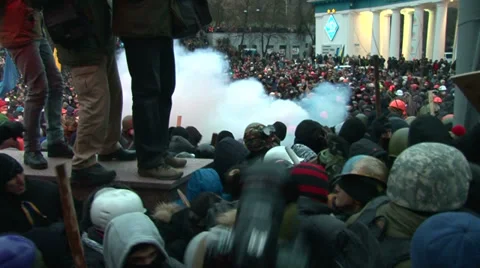 Police use gas against protesters Stock Footage