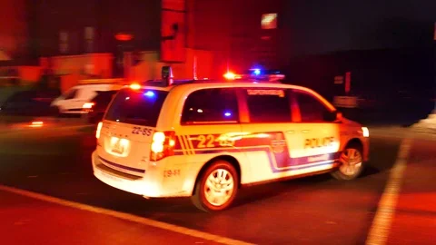 Police van blocking street joined by colleague Stock Footage 104233939