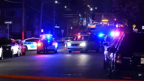 Police van driving through crime scene Stock Footage 114687577