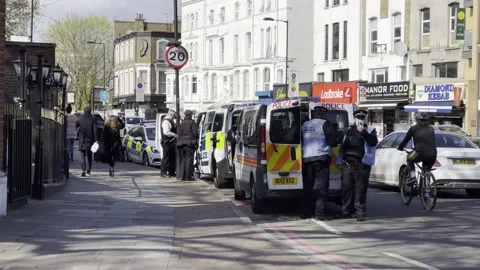 POLICE VANS AT 'KILL THE BILL' PROTEST LONDON ON EASTER WEEKEND 2021 UK 4K Stock Footage 151542321