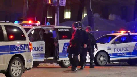 Police walking with semi automatic gun Stock Footage 133274571