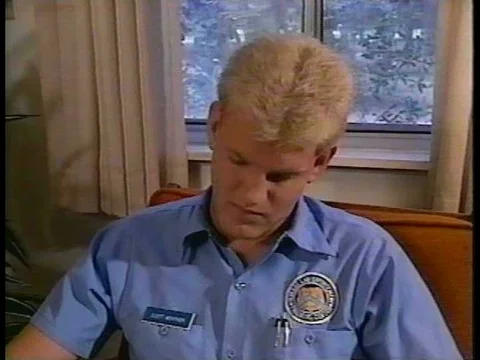 A policeman demonstrates how to improve the grip for pistol shooting in 1994. Stock Footage 75300471