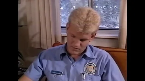 A policeman demonstrates how to improve the grip for pistol shooting in 1994. Stock Footage 82389629