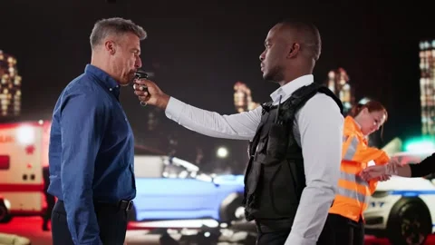 Policeman Doing Driver Alcohol Test Stock Footage 308166524