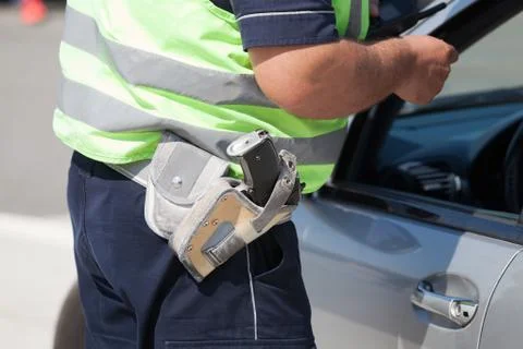 Policeman doing a traffic control Stock Photos