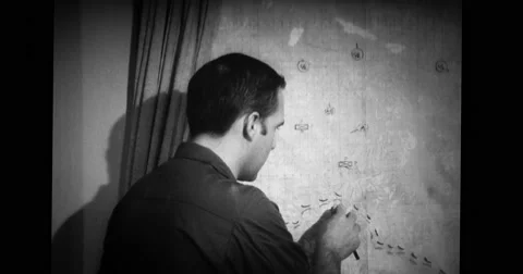 Policeman explaining strategy on map Stock Footage 43456322
