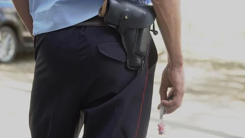 A policeman with a holster Stock Footage 116403092