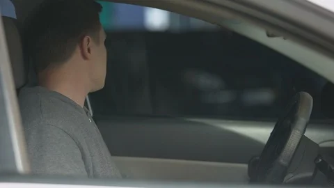 Policeman knocking car window, checking license of nervous male driver, control Video stock 111593821