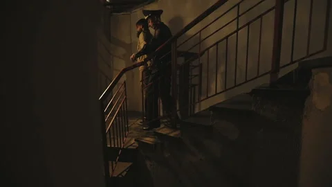 A policeman leads a criminal into the prison cell. Stock Footage 89627874
