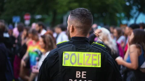 Policeman provide security at lgbt pride party. Police man monitoring safety. Stock Footage 276919834