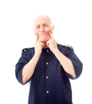 Policeman pulling funny face Stock Photos