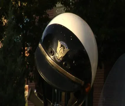 Policeman putting on helmut Stock Footage 21630710