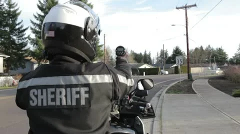 Policeman using his radar Vídeos de archivo 10583439