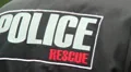Policeman with walky talky dispatched, old man in charge, secure HD Footage