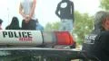 Policemen car, police man securing event, safe vehicle, duty HD Footage