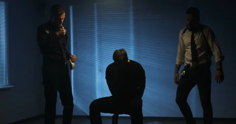 Policemen using excessive force during interrogation Stock Footage 102862204