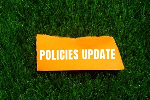 Policies update message written on ripped torn paper background. Conceptual.. 写真素材