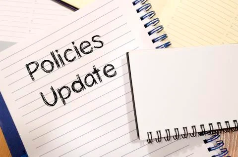 Policies update text concept Stock Photos